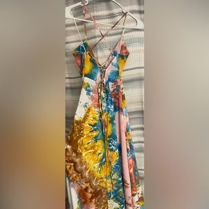 Beautiful long maxi dress with slit on right leg. Size small